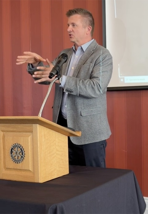 Andrew Lamppa speaking at a Rotary Club meeting in Hastings